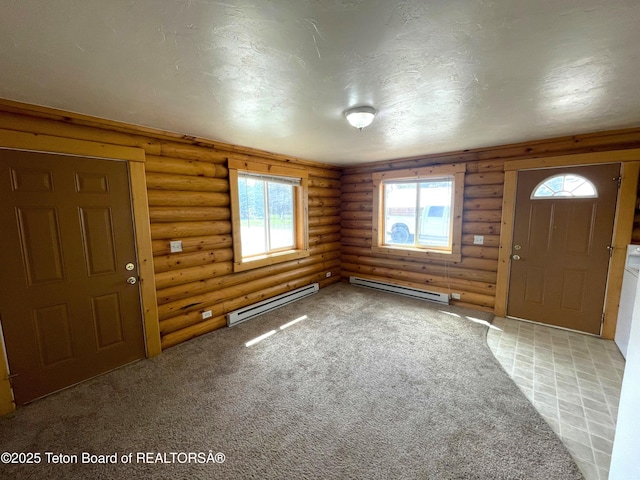 4760 W 500 W, Victor, ID 83455 - foyer with baseboard heating, rustic walls, and plenty of natural light