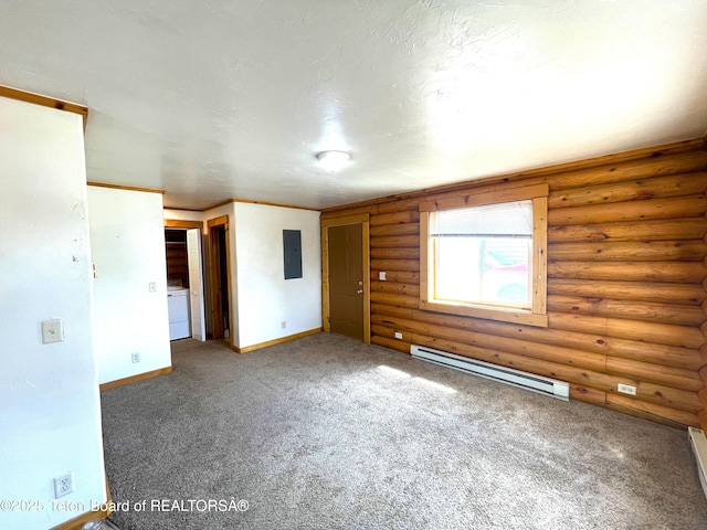 4760 W 500 W, Victor, ID 83455 - empty room featuring a baseboard heating unit, electric panel, washer / dryer, carpet, and log walls