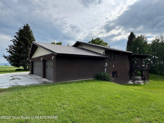 13280 N 3750 W, Felt, ID 83424 - view of property exterior with brick siding, stairway, an attached garage, and a lawn