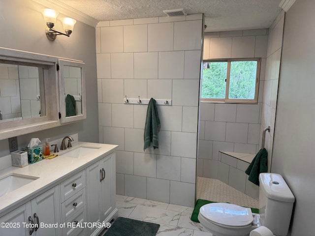 13280 N 3750 W, Felt, ID 83424 - full bath with marble finish floors, double vanity, a textured ceiling, a walk in shower, and crown molding