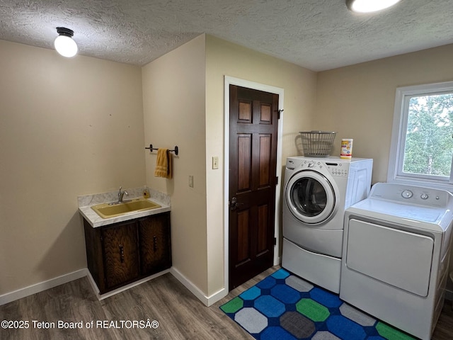 13280 N 3750 W, Felt, ID 83424 - laundry area featuring independent washer and dryer, dark wood-style flooring, and a textured ceiling