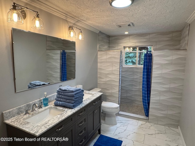 13280 N 3750 W, Felt, ID 83424 - bathroom with tiled shower, vanity, marble look tiles, ornamental molding, and a textured ceiling