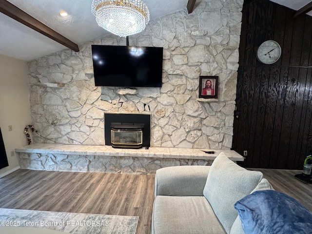 13280 N 3750 W, Felt, ID 83424 - living room featuring wood finished floors and a chandelier