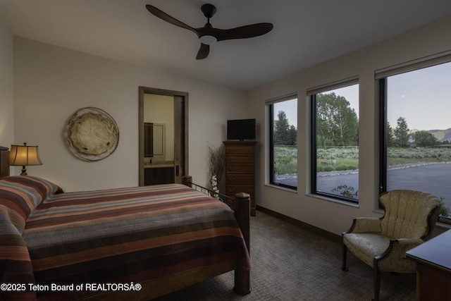580 Moulton Loop Rd, Jackson, WY 83001 - carpeted bedroom featuring vaulted ceiling, ceiling fan, and ensuite bathroom