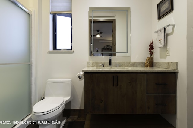 580 Moulton Loop Rd, Jackson, WY 83001 - bathroom with vanity, a stall shower, and ceiling fan