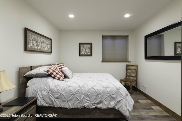 580 Moulton Loop Rd, Jackson, WY 83001 - bedroom with wood finished floors and recessed lighting