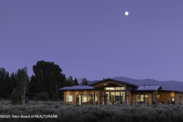 580 Moulton Loop Rd, Jackson, WY 83001 - rear view of house with a standing seam roof and a metal roof