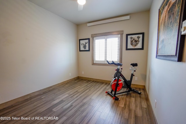 643 Country Club Way, Thayne, WY 83127 - workout area with wood finished floors and a ceiling fan