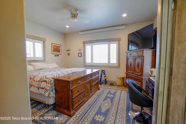 643 Country Club Way, Thayne, WY 83127 - bedroom with recessed lighting, wood finished floors, and ceiling fan