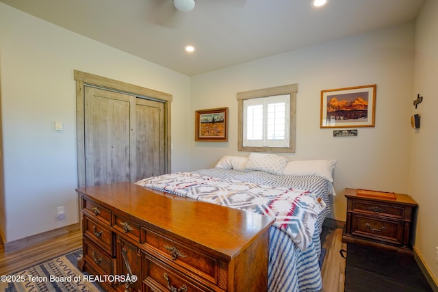 643 Country Club Way, Thayne, WY 83127 - bedroom with wood finished floors, recessed lighting, a closet, and ceiling fan