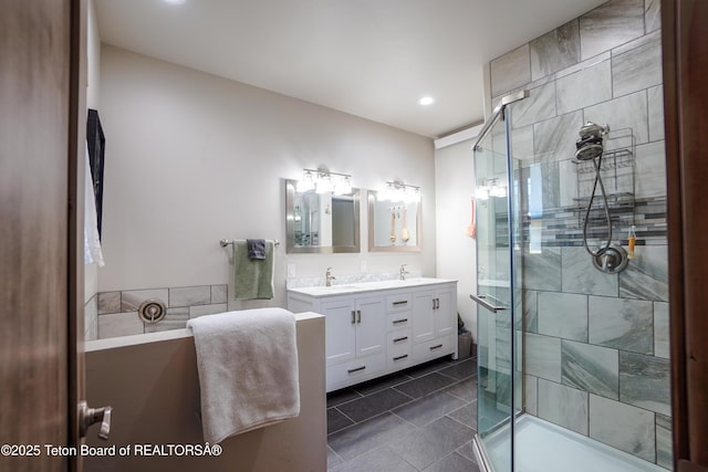 643 Country Club Way, Thayne, WY 83127 - full bathroom with double vanity, a stall shower, recessed lighting, and tile patterned flooring