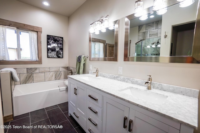643 Country Club Way, Thayne, WY 83127 - bathroom with double vanity, a bath, a stall shower, recessed lighting, and tile patterned flooring