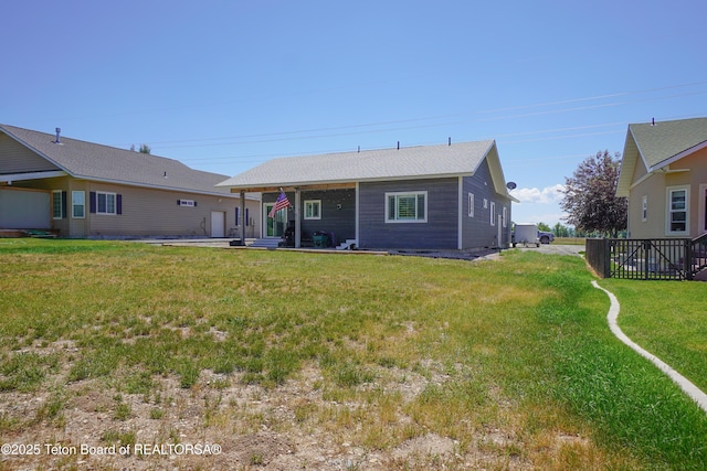 643 Country Club Way, Thayne, WY 83127 - back of property featuring a patio area and a yard