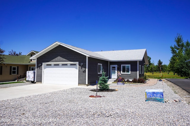 643 Country Club Way, Thayne, WY 83127 - single story home featuring a garage and concrete driveway