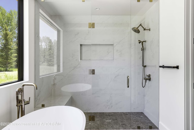 175 Huckleberry Dr, Jackson, WY 83001 - full bath featuring a marble finish shower and a freestanding bath