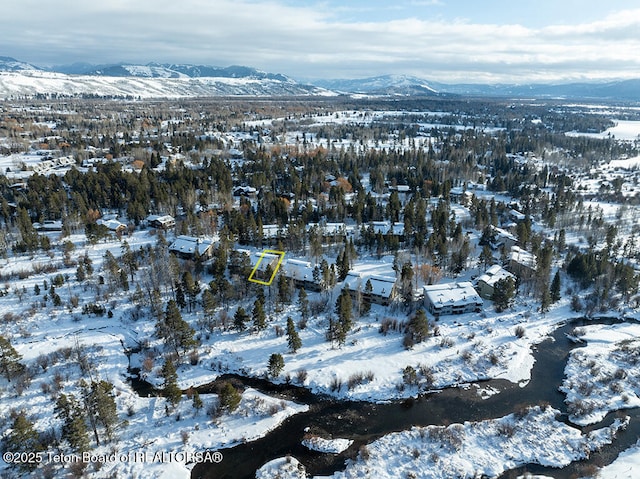 4435 Berry Dr Unit 3611, Wilson, WY 83014 - snowy aerial view featuring a mountain view