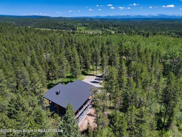 4327 Bridger Rdg, Ashton, ID 83420 - view from above of property with a heavily wooded area and a mountainous background