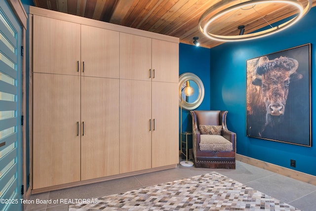 4327 Bridger Rdg, Ashton, ID 83420 - tiled bedroom featuring wood ceiling and baseboards