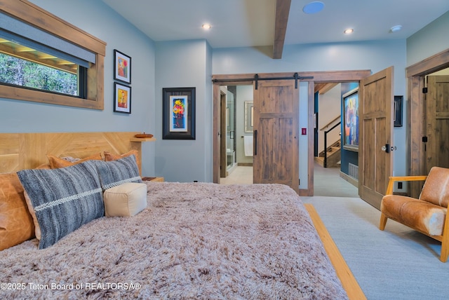 4327 Bridger Rdg, Ashton, ID 83420 - bedroom with a barn door, beamed ceiling, recessed lighting, and ensuite bathroom