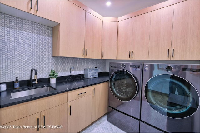 4327 Bridger Rdg, Ashton, ID 83420 - laundry area featuring cabinet space, washer and clothes dryer, and tile patterned floors