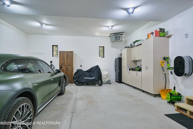 4327 Bridger Rdg, Ashton, ID 83420 - garage with freestanding refrigerator