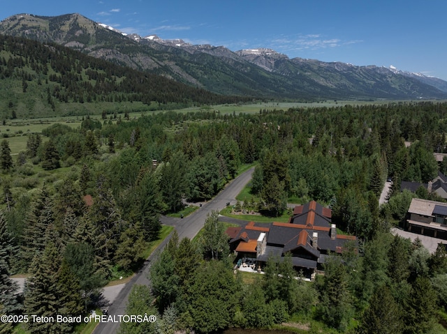 3220 N Teton Pines Dr, Wilson, WY 83014 - view of property location featuring a forest and a mountainous background