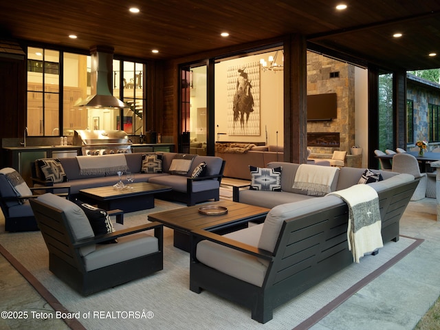 3220 N Teton Pines Dr, Wilson, WY 83014 - building lobby featuring wooden ceiling, recessed lighting, and expansive windows