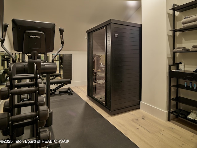 3220 N Teton Pines Dr, Wilson, WY 83014 - exercise room featuring light wood-style floors and baseboards