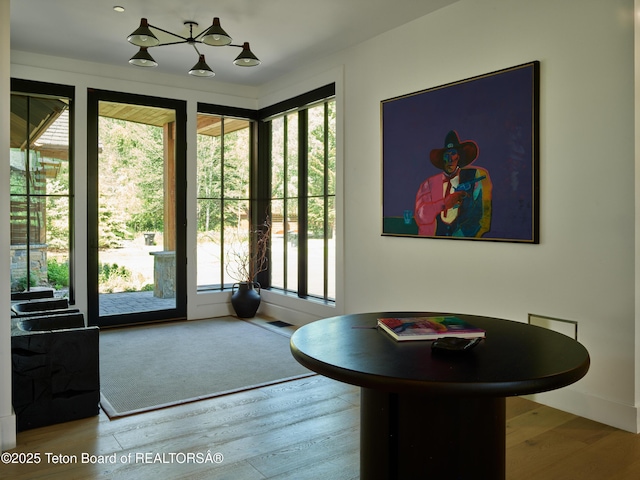 3220 N Teton Pines Dr, Wilson, WY 83014 - entryway with wood finished floors and baseboards