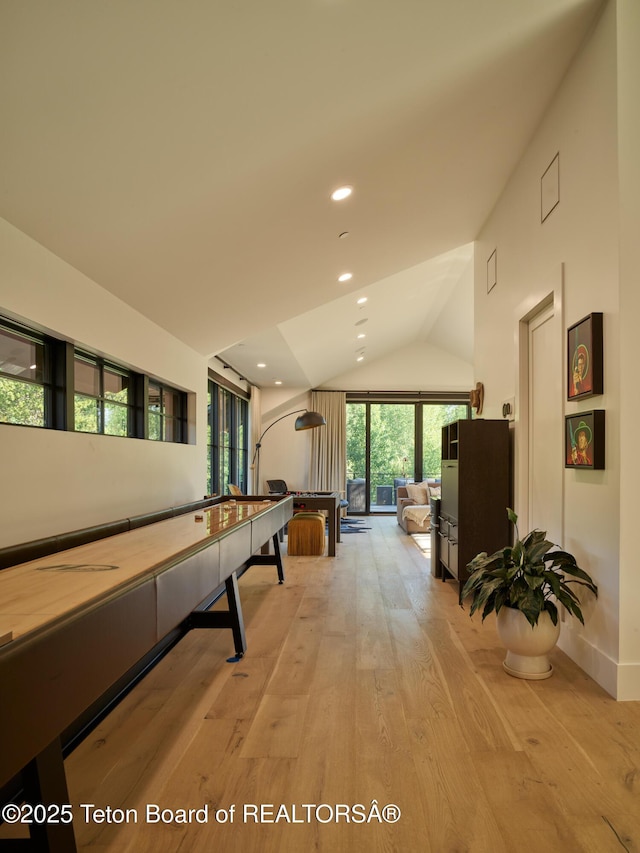 3220 N Teton Pines Dr, Wilson, WY 83014 - game room with lofted ceiling, light wood-style floors, and recessed lighting
