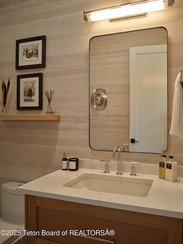 3220 N Teton Pines Dr, Wilson, WY 83014 - bathroom featuring vanity and toilet