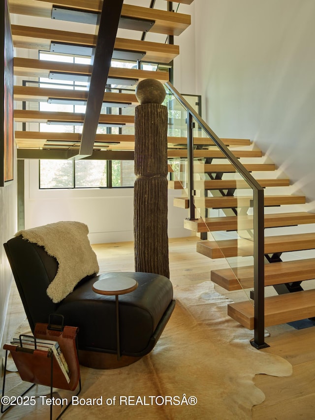 3220 N Teton Pines Dr, Wilson, WY 83014 - stairs with wood finished floors