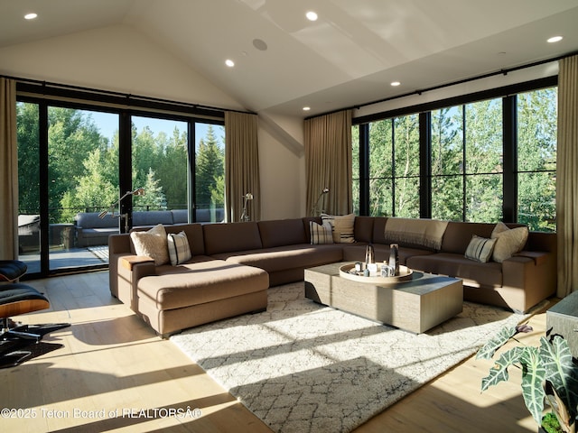 3220 N Teton Pines Dr, Wilson, WY 83014 - living room with wood finished floors, recessed lighting, and high vaulted ceiling