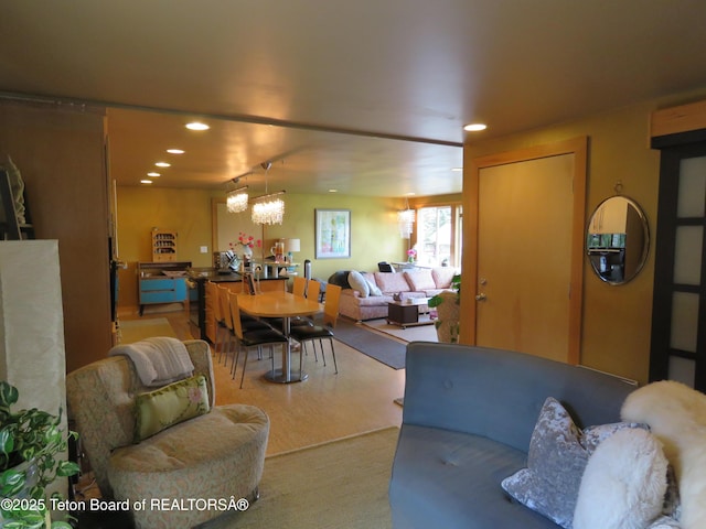 680 E Hall St, Jackson, WY 83001 - living room featuring recessed lighting, a chandelier, and carpet floors