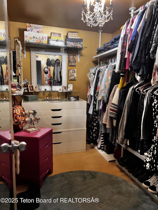 680 E Hall St, Jackson, WY 83001 - walk in closet with a chandelier