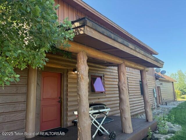 2160 Tomahawk Trl, Victor, ID 83455 - entrance to property with board and batten siding
