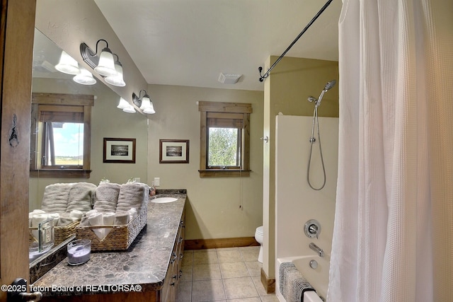 2160 Tomahawk Trl, Victor, ID 83455 - full bath featuring double vanity, shower / bath combination with curtain, and tile patterned flooring