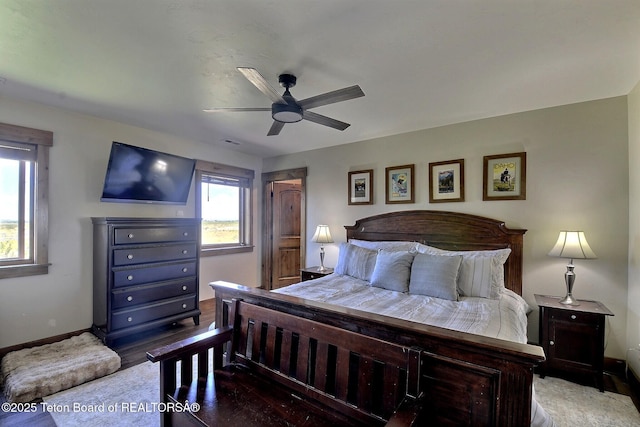 2160 Tomahawk Trl, Victor, ID 83455 - bedroom with a ceiling fan and baseboards