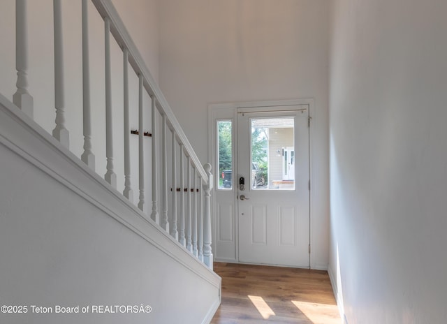 80 Eva Ln Unit 14, Victor, ID 83455 - entrance foyer with stairs, wood finished floors, and a towering ceiling