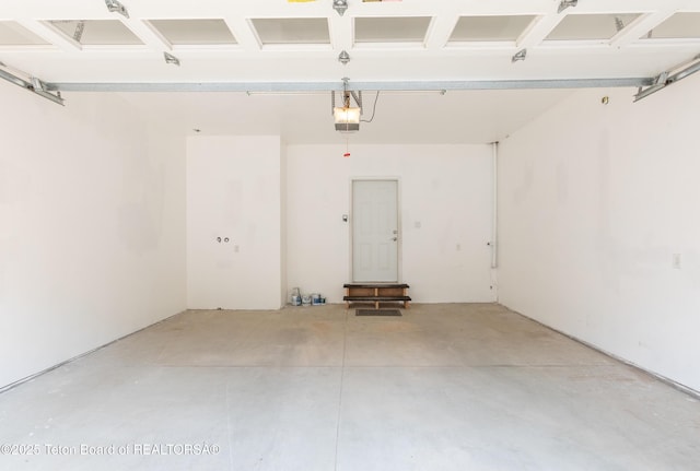 80 Eva Ln Unit 14, Victor, ID 83455 - garage with a garage door opener
