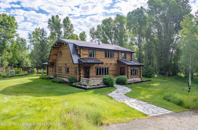 3760 N Moose-Wilson Rd, Wilson, WY 83014 - log cabin with a gambrel roof, log siding, and a metal roof
