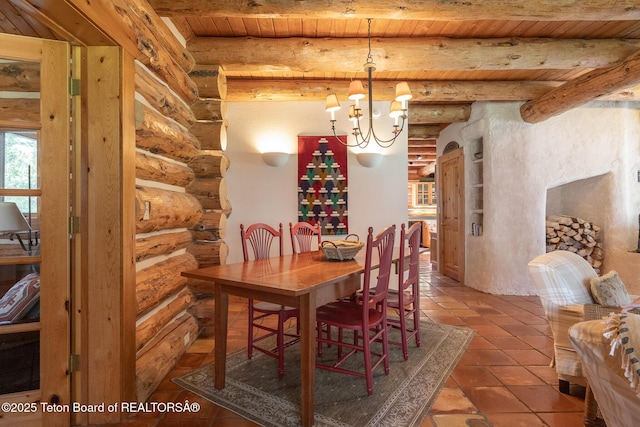 3760 N Moose-Wilson Rd, Wilson, WY 83014 - tiled dining space with rustic walls, a wooden ceiling with exposed beams, and a chandelier