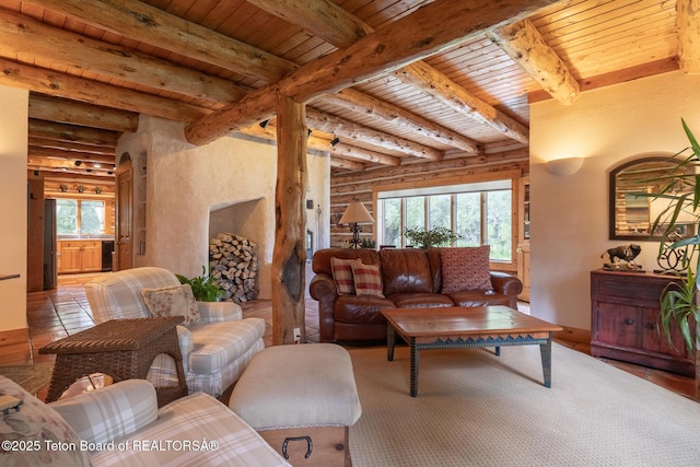 3760 N Moose-Wilson Rd, Wilson, WY 83014 - living area with a wooden ceiling with exposed beams, rustic walls, and arched walkways