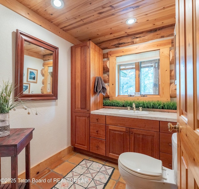 3760 N Moose-Wilson Rd, Wilson, WY 83014 - bathroom with recessed lighting, vanity, and wood ceiling