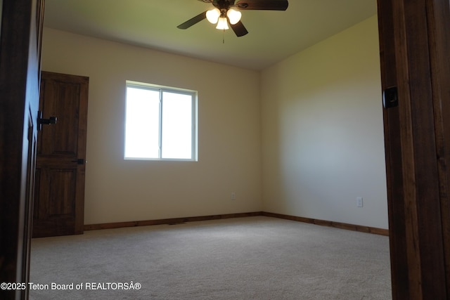 1350 Arroyo, Pinedale, WY 82941 - unfurnished room with light carpet, a ceiling fan, and vaulted ceiling