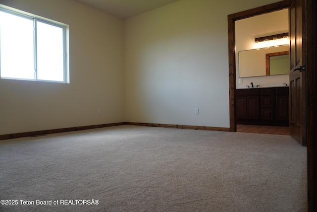 1350 Arroyo, Pinedale, WY 82941 - spare room featuring carpet floors and baseboards