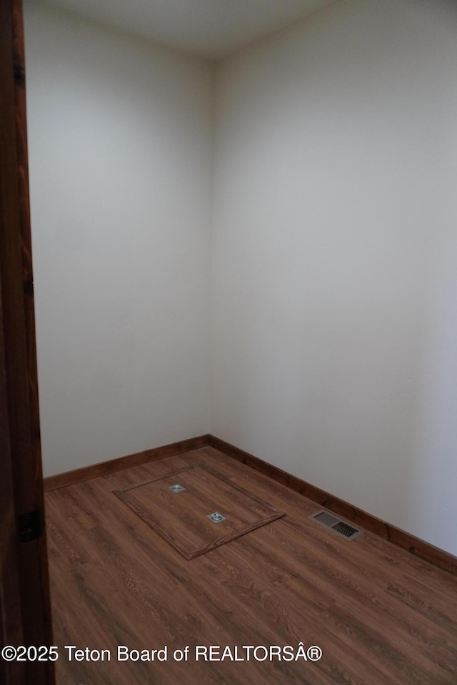 1350 Arroyo, Pinedale, WY 82941 - unfurnished room with wood finished floors and baseboards