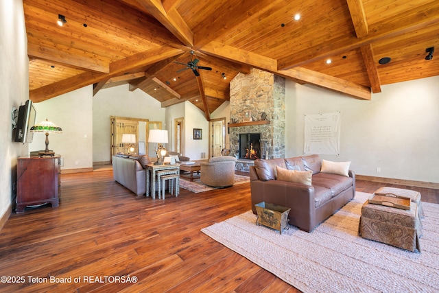 500 E Buckwheat Cir, Jackson, WY 83001 - living area featuring wood-type flooring, a ceiling fan, a fireplace, and wooden ceiling
