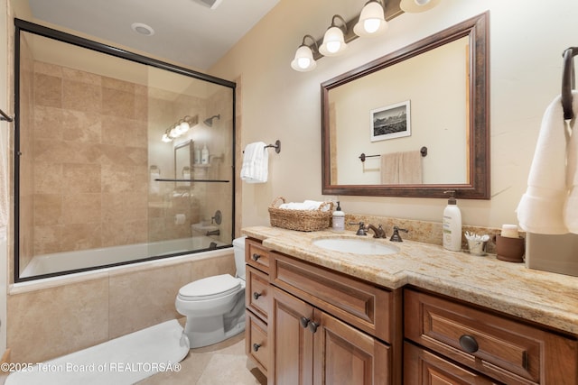 500 E Buckwheat Cir, Jackson, WY 83001 - bathroom with vanity, tiled shower / bath combo, and tile patterned flooring