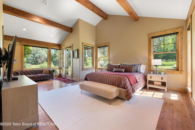 500 E Buckwheat Cir, Jackson, WY 83001 - bedroom with multiple windows, light wood-style flooring, and recessed lighting